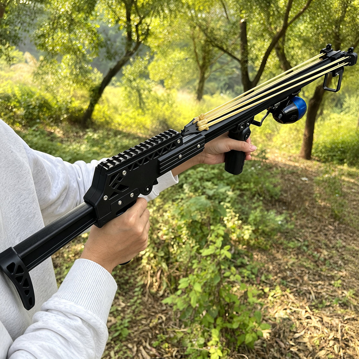 New Upgraded Outdoor Fishing Slingshot, Heavy Duty Fish Rod Slingshot Gear, Max Performance Metal Slingshot, Safety Lock Trigger Automatic Slingshot, Essential for Outdoors Lakes,Rivers Fishing and Forest Shooting,Adult Slingshot with Rubber Bands